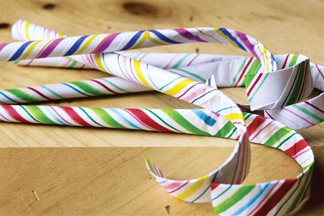 Rolled paper candy canes.