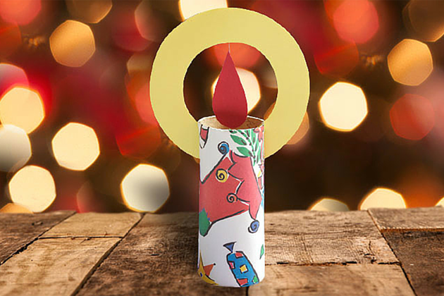 A pretend candle made from a cardboard tube and construction paper flame.